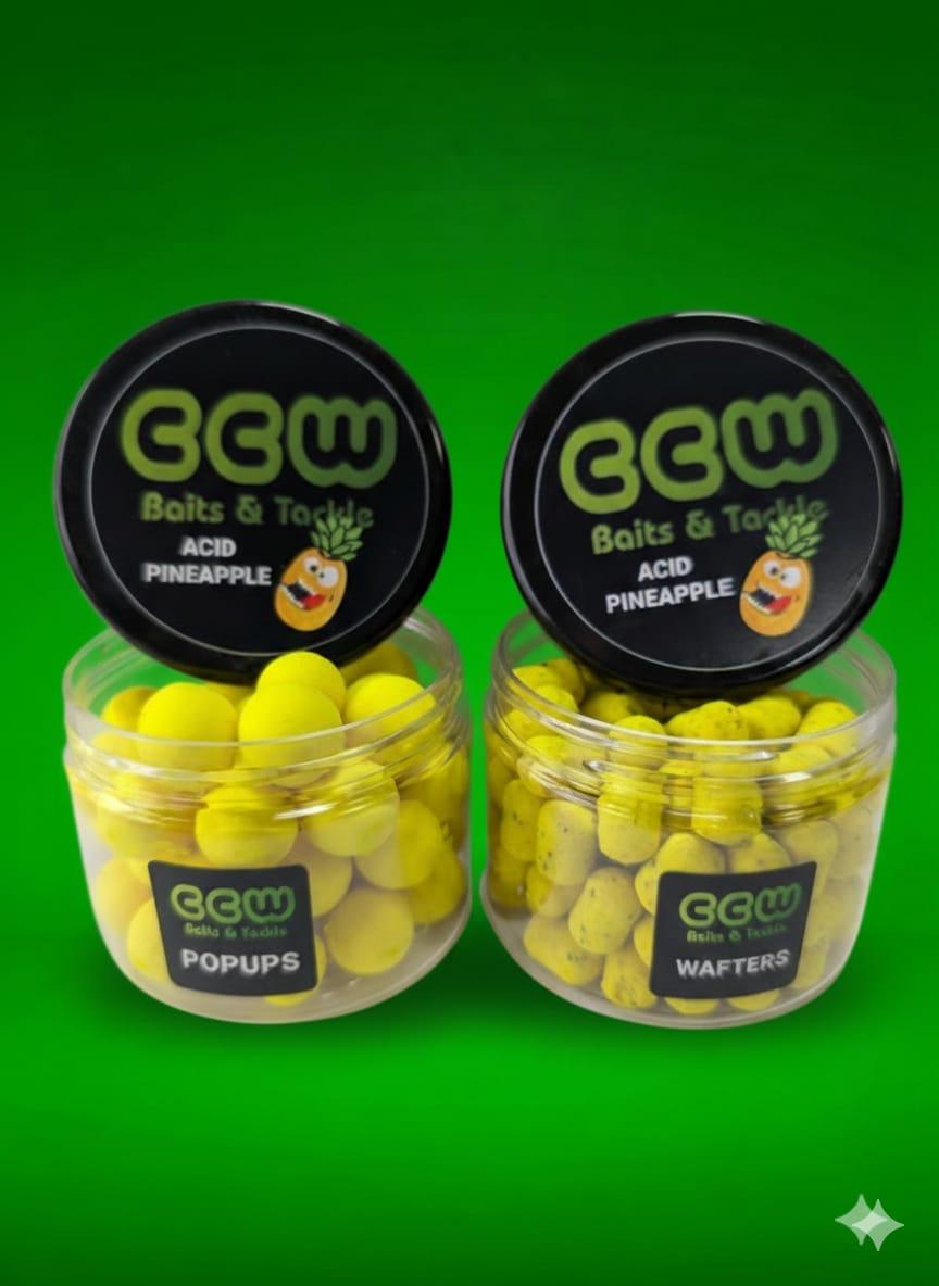 Two containers of Acid Pineapple Baits & Tackle on a green background