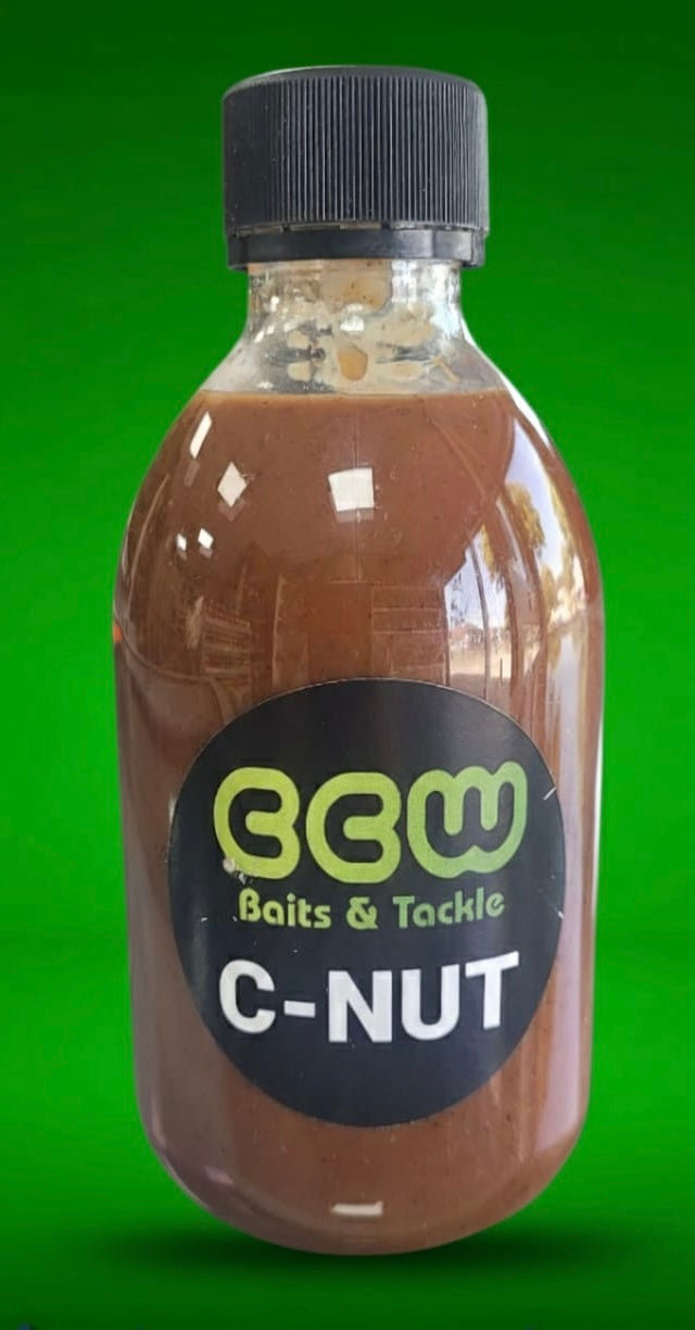 Bottle of C - Nut with CCW Baits & Tackle label on a green background
