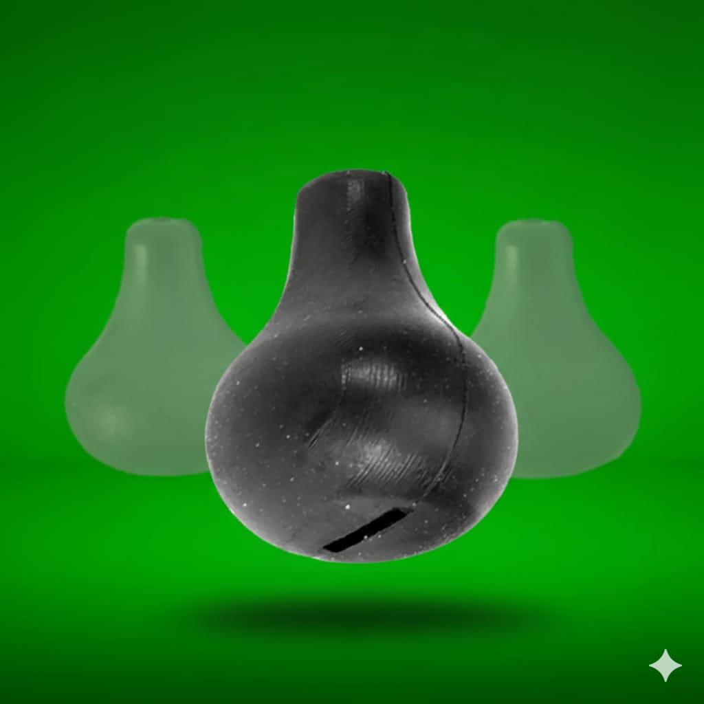 Dead Weight Tungsten Swivel Beads On a green background