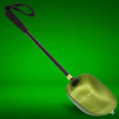 Long Handke Baiting Spoon on a green background 