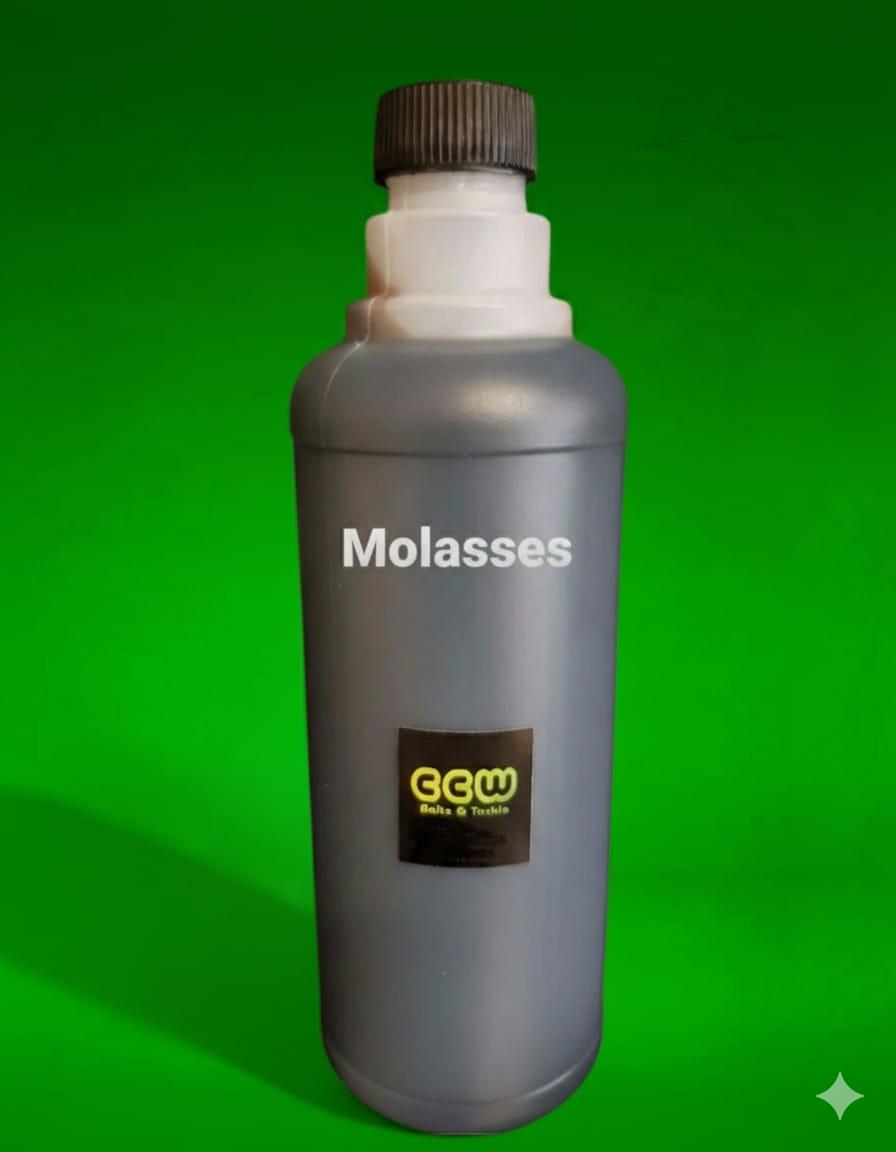 Bottle of molasses with a CCW label on a green background