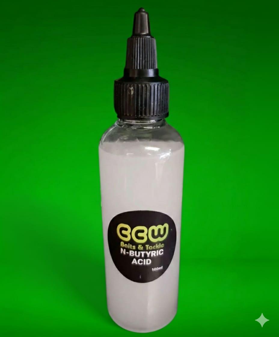 Bottle of N - Butyric Acid with a black cap on a green background